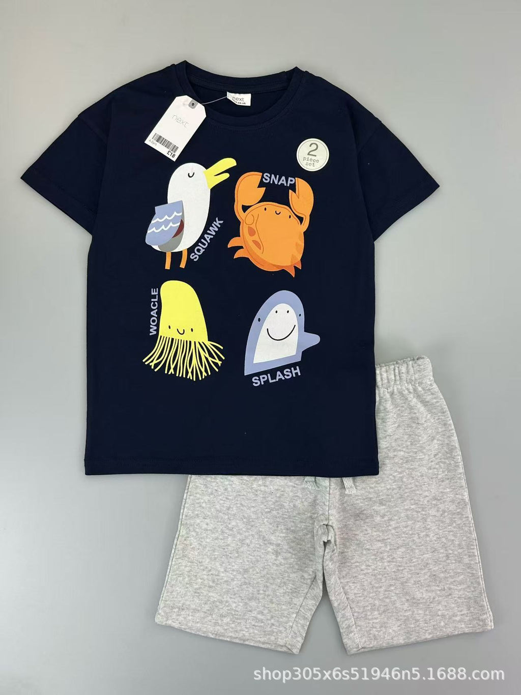 Trendy Euro-American style striped T-shirt and shorts set for boys—stylish, casual, and perfect for summer