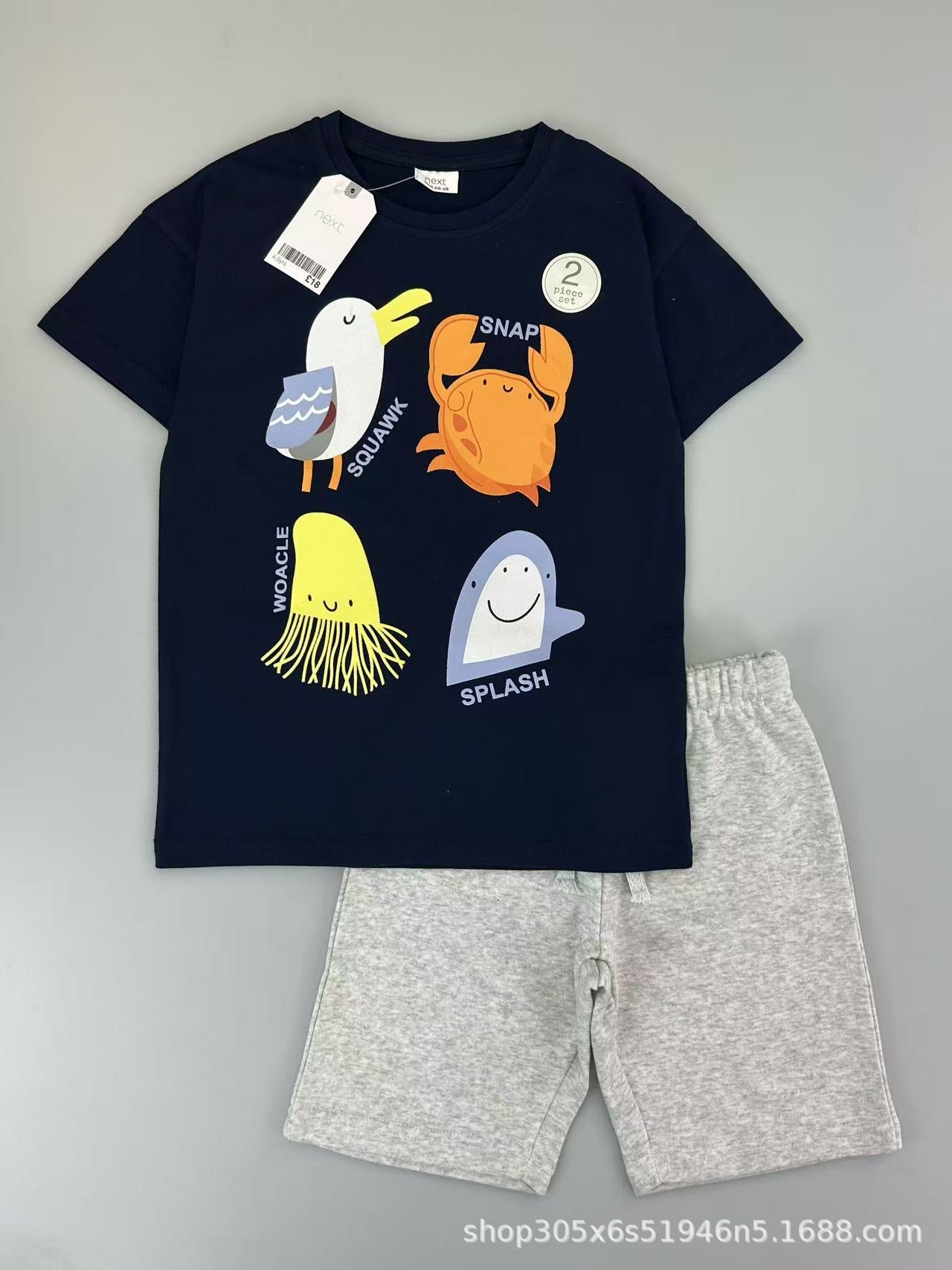 Trendy Euro-American style striped T-shirt and shorts set for boys—stylish, casual, and perfect for summer