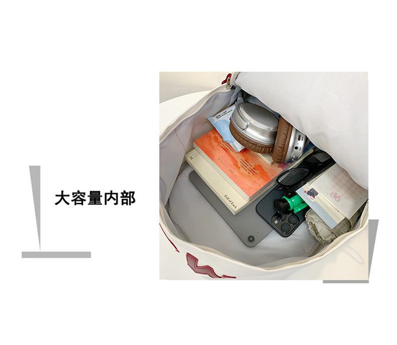 书包2026新款简约双肩包男孩小学生女孩大容量轻便耐磨通勤背包
