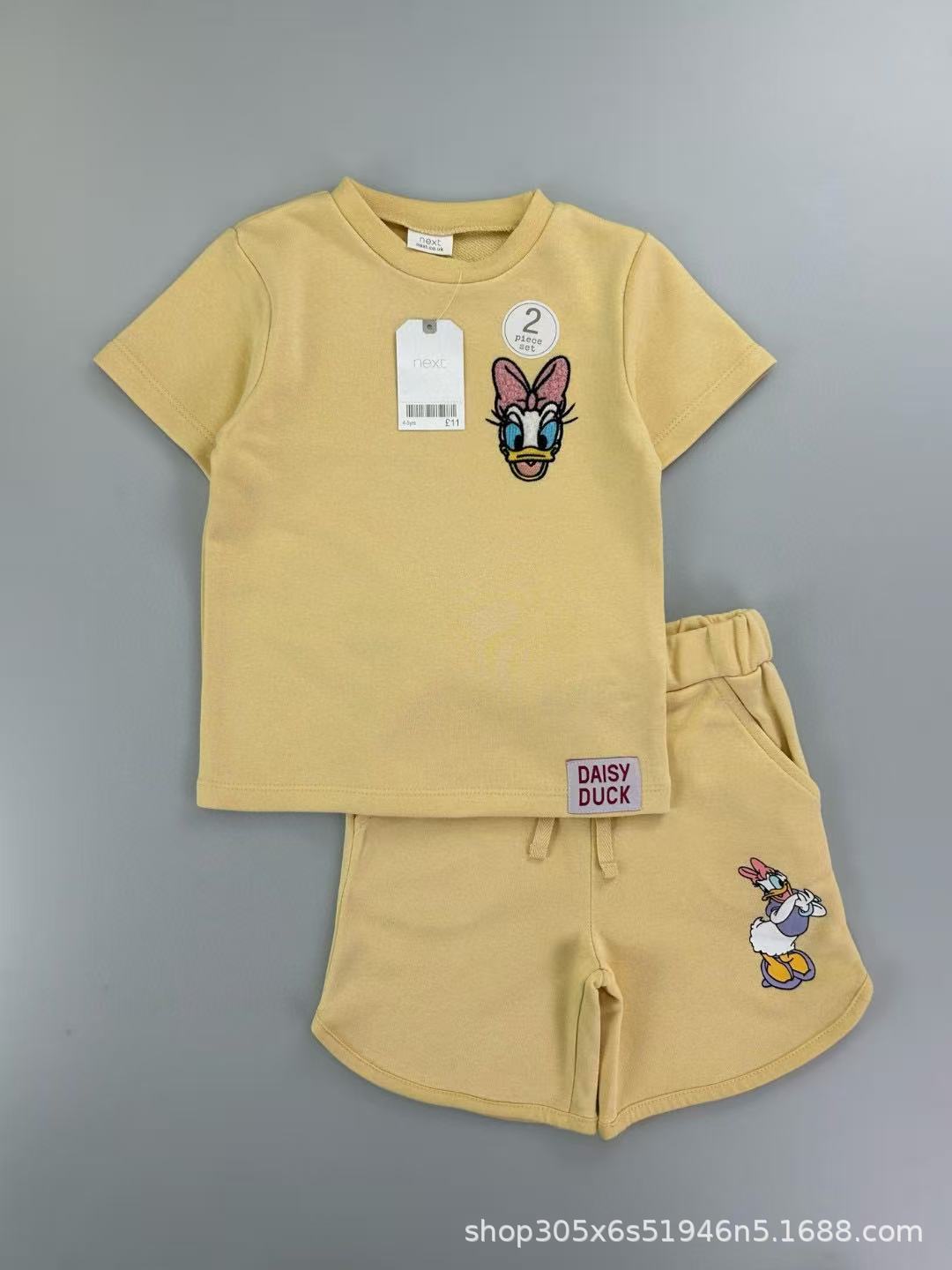 Trendy Euro-American style striped T-shirt and shorts set for boys—stylish, casual, and perfect for summer